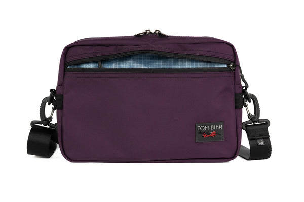 The Side Hustle in Aubergine Ballistic with Tidal (pale blue) 210 Cerylon interior.